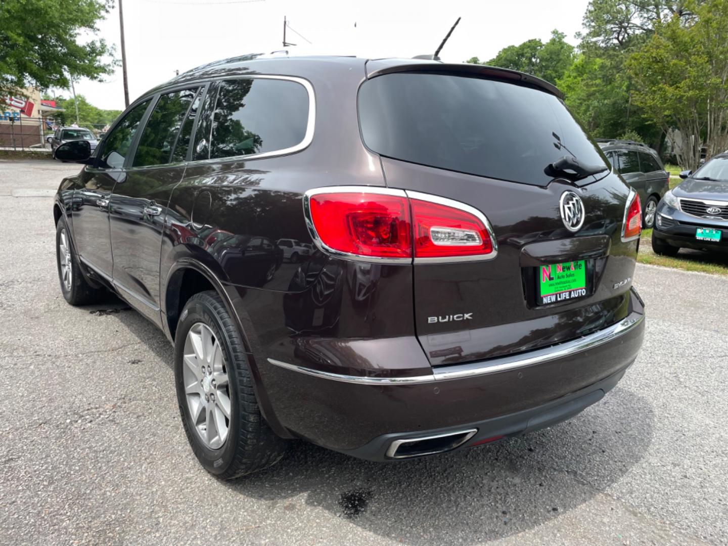 2016 BROWN BUICK ENCLAVE LEATHER (5GAKRBKD4GJ) with an 3.6L engine, Automatic transmission, located at 5103 Dorchester Rd., Charleston, SC, 29418-5607, (843) 767-1122, 36.245171, -115.228050 - Photo#4